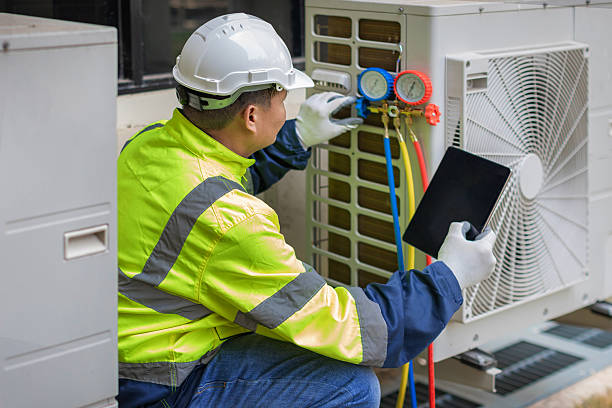 Professional Hvac technician working in Tiffin, IA